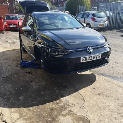 Car raised on a jack with the wheel removed during ResQ Tyres mobile tyre fitting in Leeds